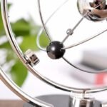 balancier perpetuel newton serenite et science au bureau 610 1