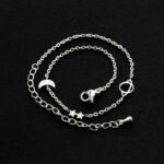 bracelet elegant aux motifs planetaires et etoiles argente 262 1