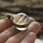 collier planete jupiter lelegance de la majeste celeste bronze 300 1
