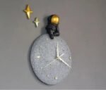 Horloge Murale Astronaute Assis Sur La Lune