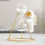 sablier astronaute explorez lunivers avec style et fonctionnalite dore 648 1